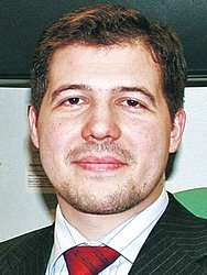 Евгений Надоршин: «Миру грозит третья волна финансового кризиса»